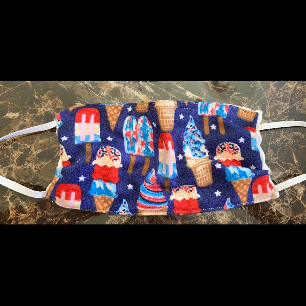 Face mask with adjustable nose piece